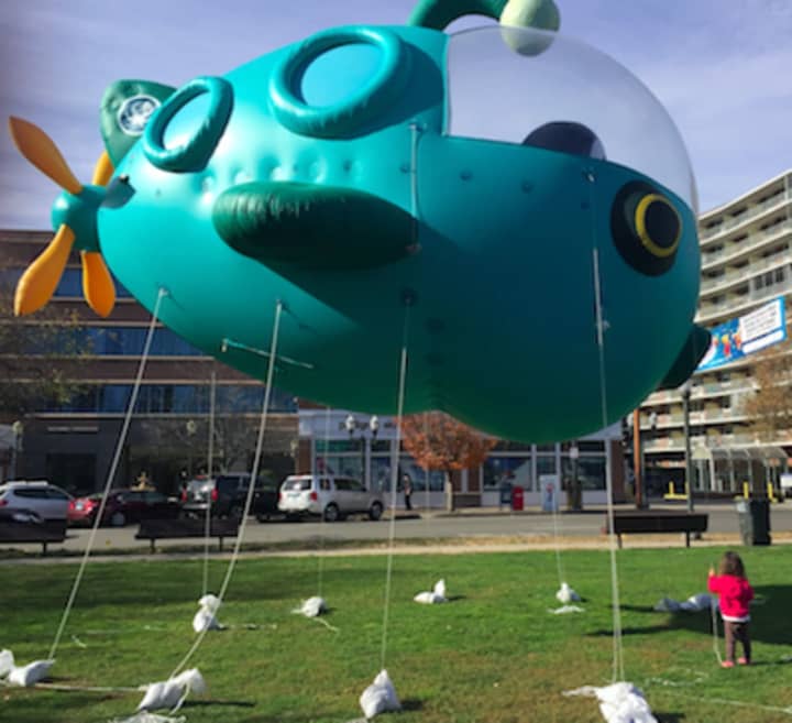 A child looks at the Octonauts ballon that will be one of the balloons at the UBS Parade Spectacular on Nov. 20 in Stamford.
