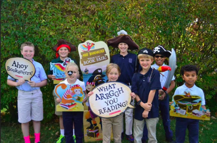 Pear Tree Point School students dressed in pirate attire for the &quot;Bookaneer&quot; Autumn book fair - from left, Will Warnock, Hans Baurmeister, Lucy Logan, Daphne Upson, Colten Trepp, Stewart Upson, Joshua Fields and Isaiah Fields.