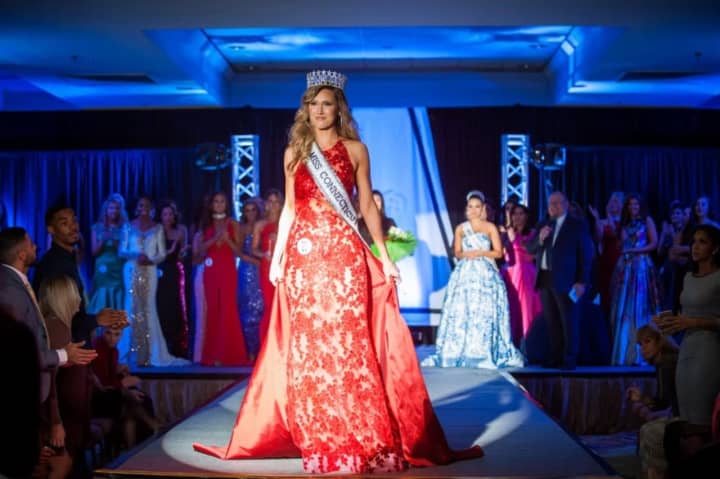 Olga Litvinenko of Greenwich steps forward as crowned Miss Connecticut USA 2017 during the weekend competition in Stamford.