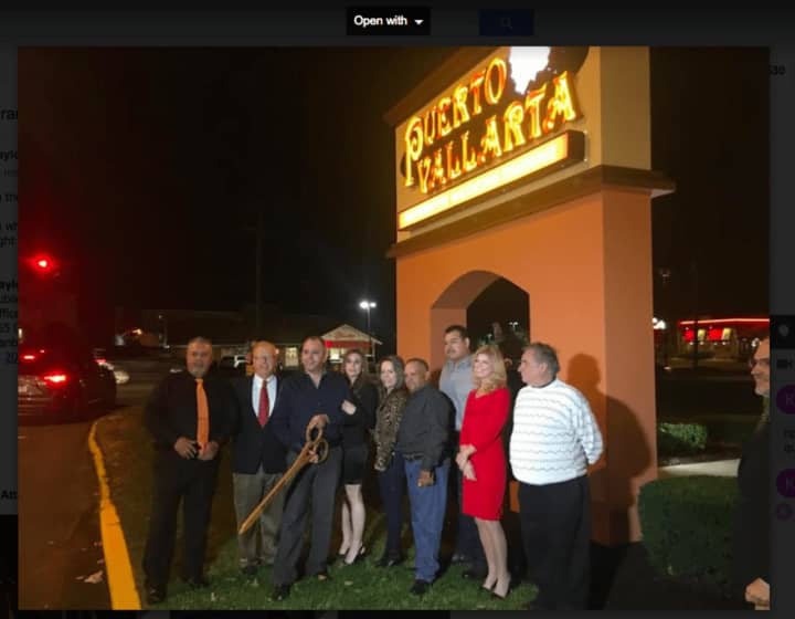 Danbury Mayor Mark Boughton, Puerto Vallarta owner Esaul Rodriguez and his wife, attend the ribbon cutting of the restaurant in Danbury, which offers Mexican food.