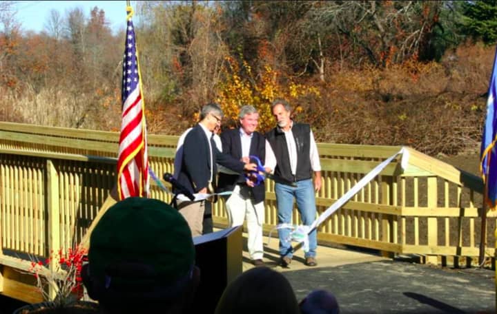 A weekend ribbon-cutting for the new Still River Greenway in Brookfield draws a crowd of about 100 people.