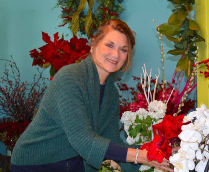 Danna DiElsi enjoys creating silk floral arrangements at The Silk Touch of Norwalk.