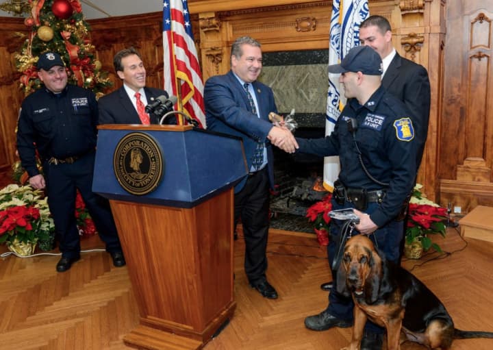 Yonkers Mayor Mike Spano awarded Yonkers K-9 Cali as employee of the month for Novemeber.