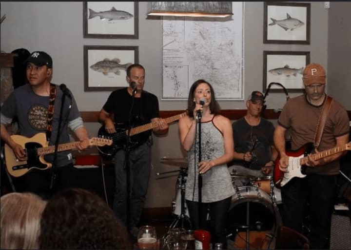 Members of Ridgefield-based &quot;On The Rocks&quot; band: From left, Win Sakdinan (guitar), Brian Connally (bass), Erika Howard (lead vocals), John Sobocinski (drums) and Kevin Kuntz (guitar)