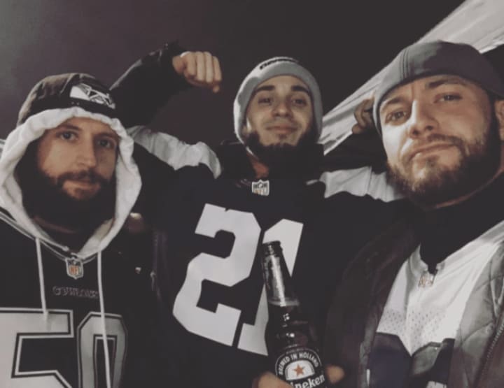 Cowboys Fan Billy Kuzmanovski, center, with two friends from the New Jersey area.