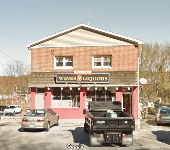 Two men robbed, vandalized and set fire to the Rooster Wine &amp; Liquor Store at 113 S. Main St., Newtown police said.