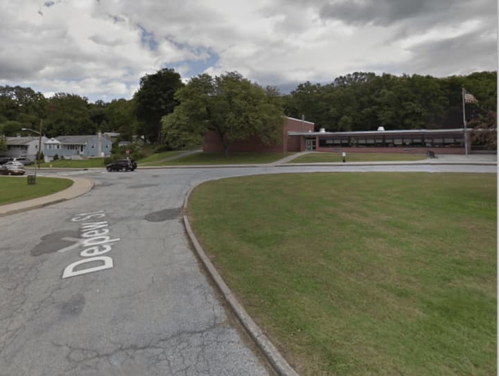 Two men hiking behind Woodside Elementary School caused a district-wide lockdown of schools on Monday.