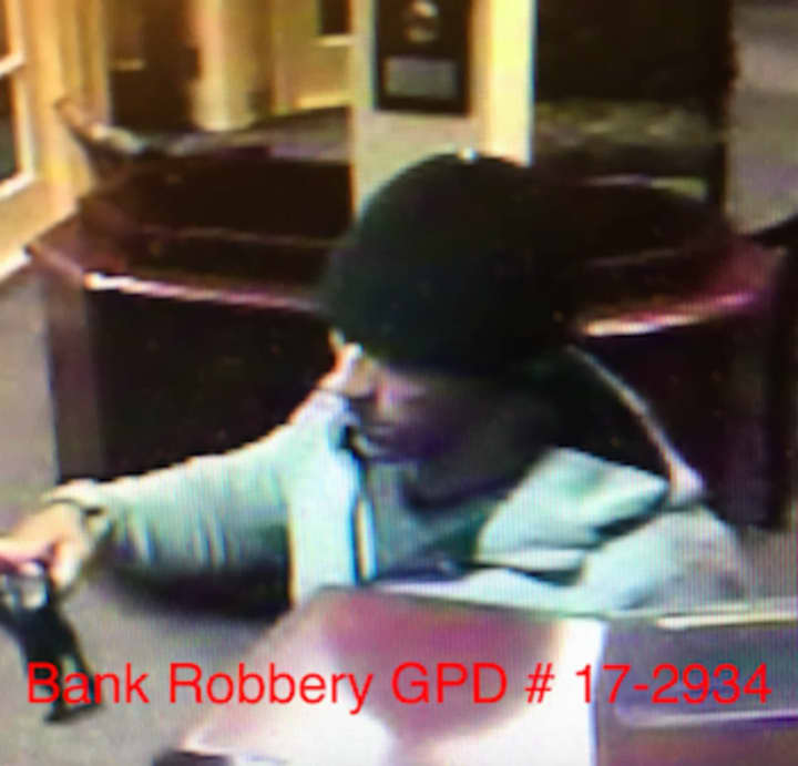 The suspect in an armed bank robbery in Greenwich on Wednesday afternoon.He&#x27;s being sought in Port Chester, N.Y. after crashing and abandoning his car during a police pursuit.