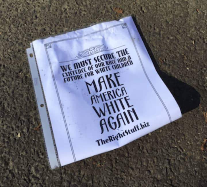 One of five white supremacist flyers found in driveways on Newtown Avenue Monday morning. Norwalk Police are investigating. Similar flyers have been found in Wilton.