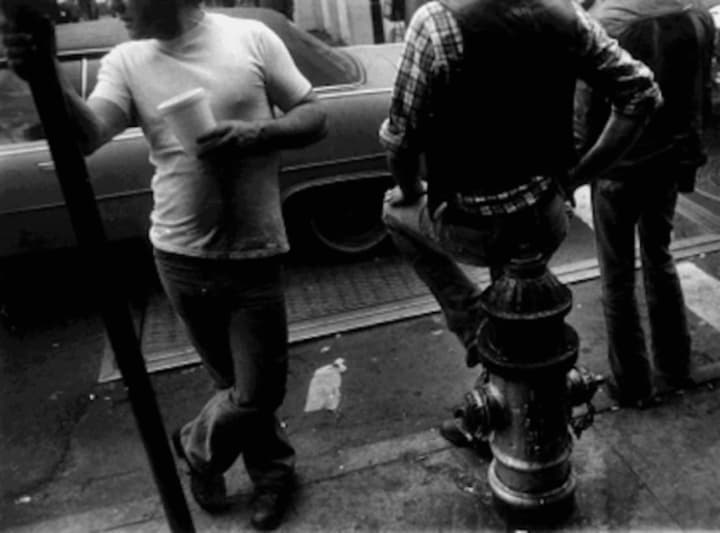 Leon Levinstein&#x27;s &quot;Man Holding Cup&quot; is part of a new photography exhibition at the Bruce Museum in Greenwich.