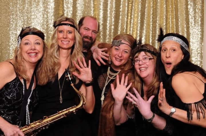 Members of the Bad Dog Buddy band founded by New Canaan mom Julie Kurtzman.  From left, Susan Brill, Michelle Gottfried, Ken Kurtzman, Michelle Orr, Julie Kurtzman, Kim Markin.  Missing from photo: Alan Martin and two new singers.