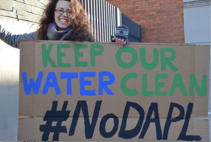 Norwalk resident Jessica Kurose organizes a protest in Stamford against the construction of the Dakota Access Pipeline.