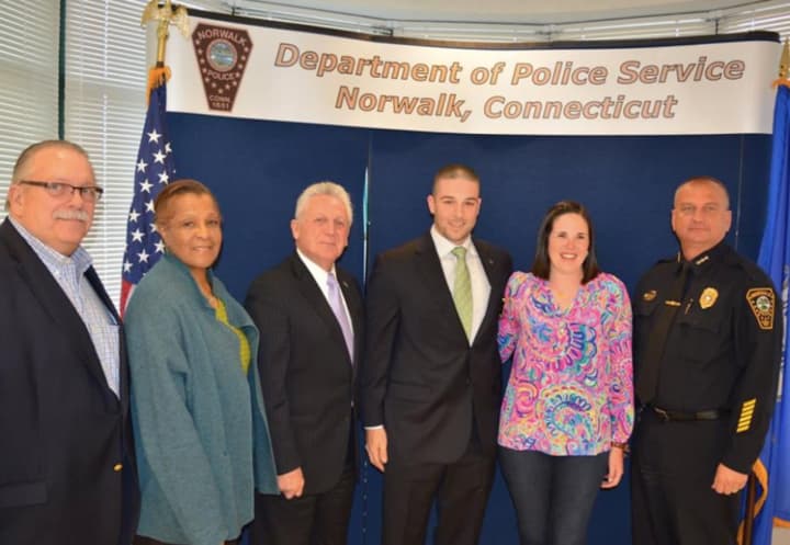 The Norwalk Police Department announced the promotion of Sergeant Justin Bisceglie (third from right).