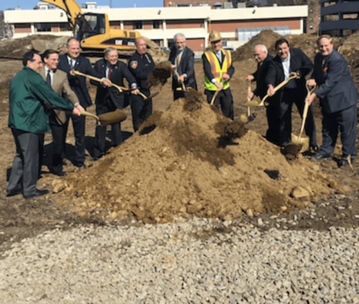 Stamford held the groundbreaking ceremony for the new police headquarters Tuesday morning. The current headquarters can be seen in the background.