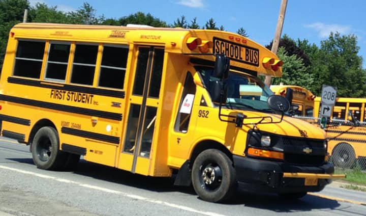 A bus driver and monitor were arrested for endangering the welfare of an autistic teenager that went missing after an event in New Rochelle.