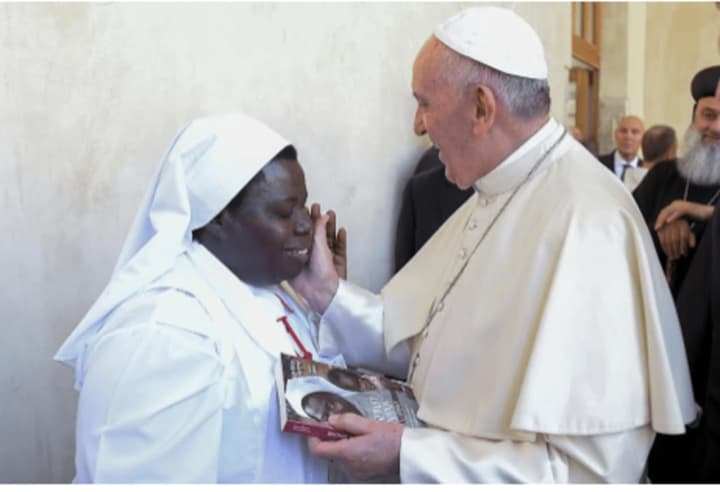 Sister Rosemary Nyirumbe, CNN Hero and humanitarian receives a blessing from Pope Francis. She will give a talk Monday, April 10 at Round Hill Community Church in Greenwich on her lifesaving work with victims of violences in Uganda and Sudan.