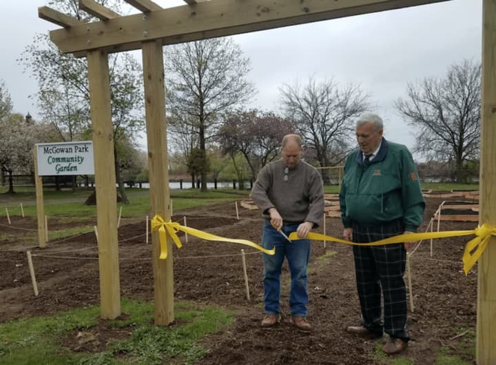 Ridgefield Park Mayor George Fosdick, right, and Ridgefield Park Green Team Chairman Mark Olson celebrate Earth Day by officially opening Ridgefield Park&#x27;s new Community Garden at McGowan Park.