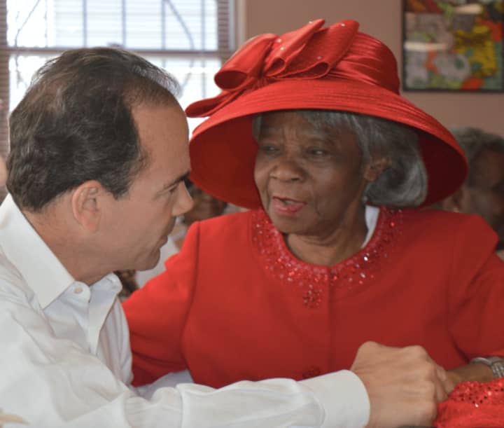 Ivy WIlloughby, right, chats with Mayor Joe Ganim at the Bethany Senior Center in Bridgeport&#x27;s North End.