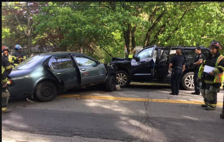A car, left, and SUV were involved in the head-on crash