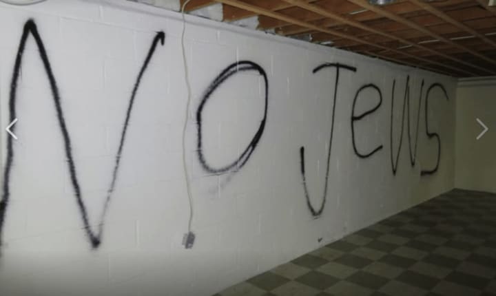 A local home inspector found anti-Semitic messages spray painted in a home in Haverstraw.