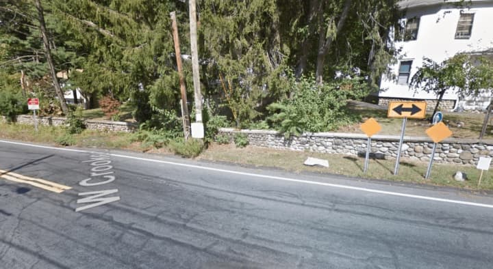 A Suffern man was charged with DWI after failing to obey a stop sign and hitting a stone wall.