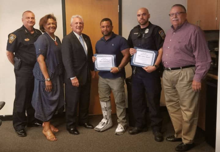 The Norwalk Police Department honors its officers of the month for June.See story for IDs.