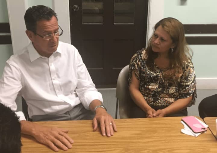 Gov. Dannel Malloy meets with Nury Chavarria at Iglesia De Dios Pentecostal church in New Haven on Thursday. Chavarria took refuge in the church after she was ordered to be deported.