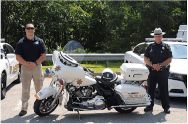 Members of the Putnam County Sheriff’s Office Motorcycle Unit, with new motorcycle dedicated to the memory of deceased Senior Investigator Mark R. Gilmore.