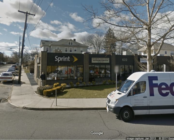 Two Yonkers Sprint employees were robbed at gunpoint and locked in a bathroom.