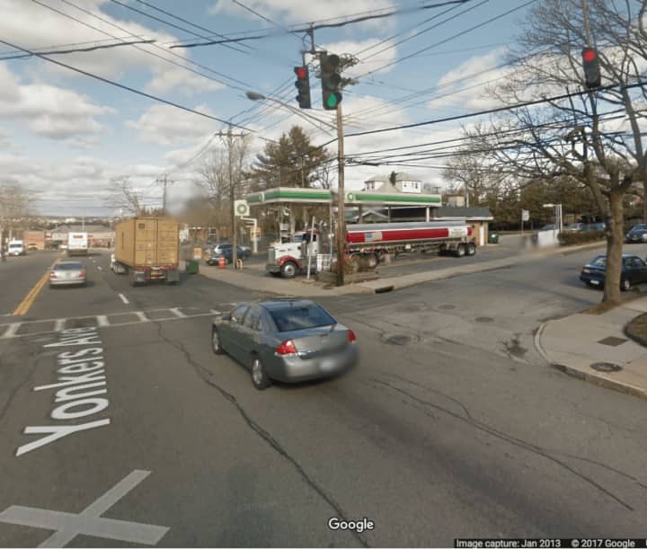 Yonkers police are searching for two armed men who robbed a gas station.