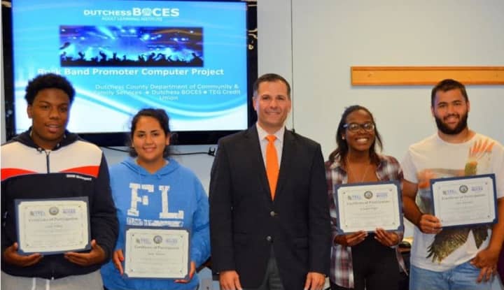 Students in the Youth Financial Literacy &amp; Computer Training Program are congratulated by County Executive Marc Molinaro.