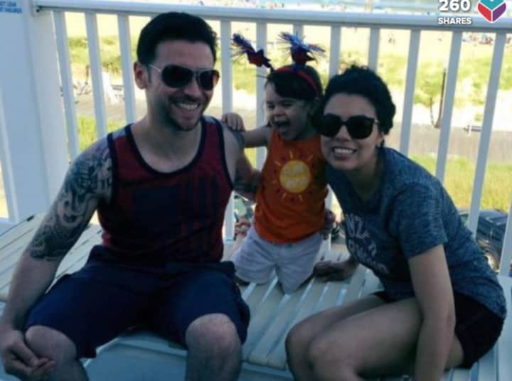 Michael Paul Albanese, 35, with his daughter, Aria, and wife, Grace.