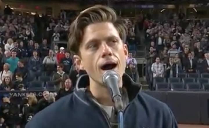 Middletown native Aaron Tveit sang the National Anthem prior to Tuesday night&#x27;s Wild Card Game at Yankee Stadium.