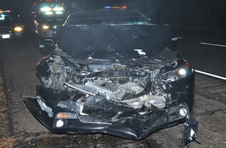 A drunken driver slammed this car into a Connecticut State Police SUV that was stopped to investigate a fatal crash on I-91 northbound in Cromwell.