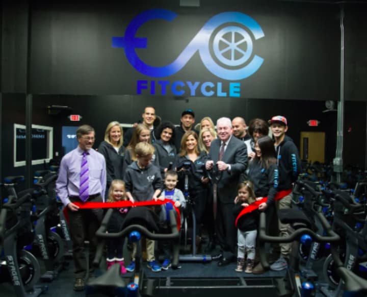 Fairfield First Selectman cuts the ribbon at the grand opening of FitCycle Studio.