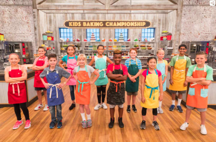 The contestants on &quot;Kids Baking Championship.&quot; Closter&#x27;s Linsey Lam is in the front on the right side.