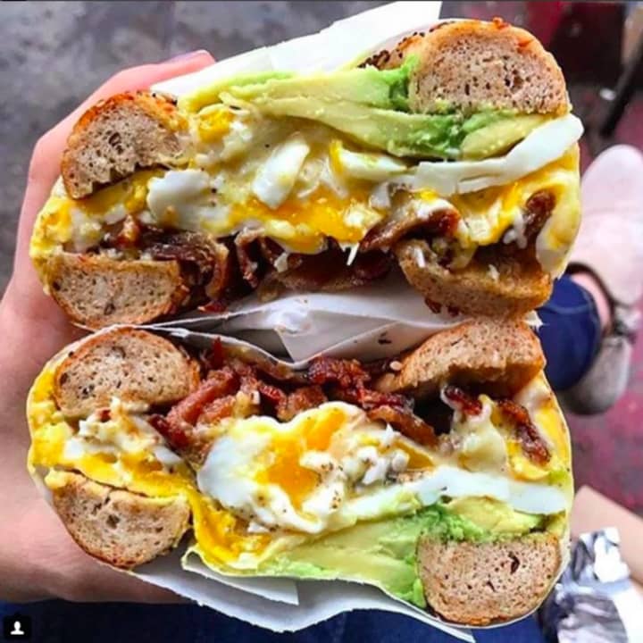 Bacon, egg, American cheese and avocado on a freshly baked whole wheat bagel at Not Just Bagels and Pizza in Bergenfield.