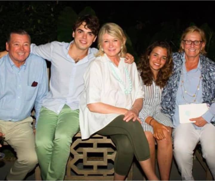 Three of the victims of the plane crash are shown in this photo posted by Martha Stewart, center. They are: builder Ben Krupinski (far left), grandson William Maerov (second from left), and Bonnie Krupinski (far right).