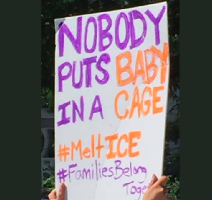 This was one of the signs displayed Saturday during the rally in Stamford.