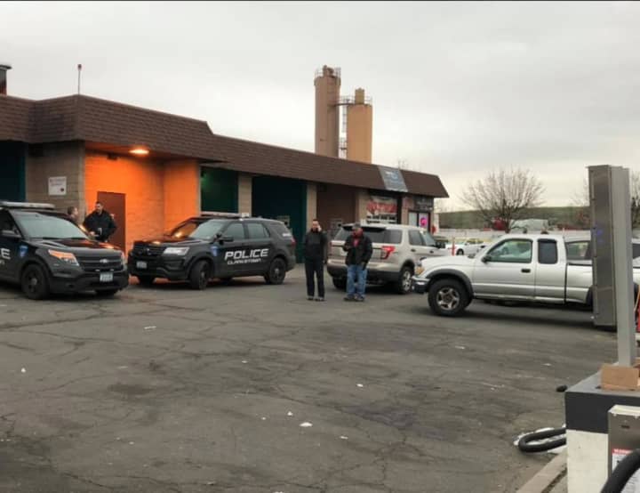 Police respond after the mid-afternoon shooting at Youbs Auto Sales, located at 357 Route 59 in West Nyack on Saturday.
