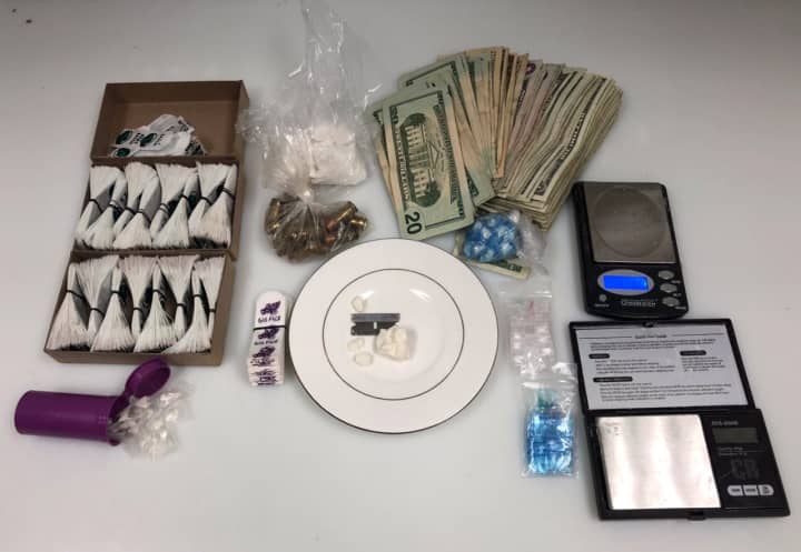 Search warrant execution in Asylum Hill neighborhood, 116 Huntington St, 1st floor. 1,000 bags of heroin/fentanyl and 70 grams crack cocaine seized.