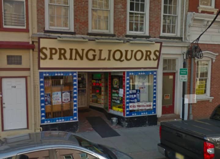 The incident occurred outside of Spring Liquors in Newton.