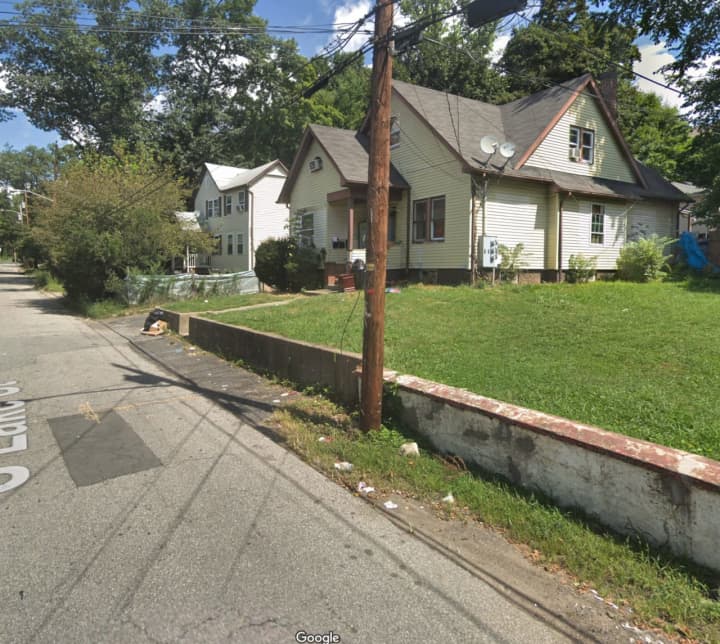Police in Rockland executed a search warrant at a Lake Street residence in Spring Valley that was being used to house illegal weapons and drugs.