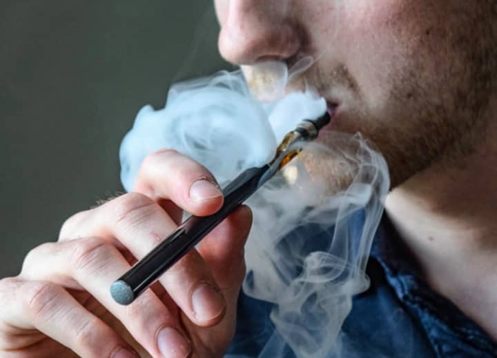 Nine were hospitalized with breathing problems after vaping, state health officials said.