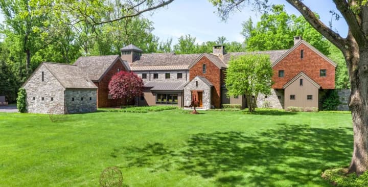 The six-bedroom, six-and-a-half bathroom, 11,423-square-foot estate is on 2.65 acres of property.