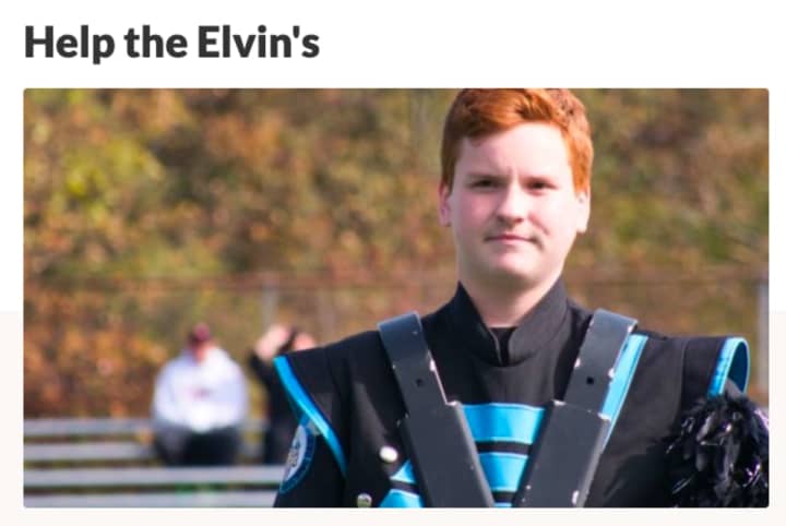 William Elvin, a Parsippany Hills HS student and marching band member, has help from teacher Michael Iapicca in recovering from the house fire that displaced his family on Dec. 5.