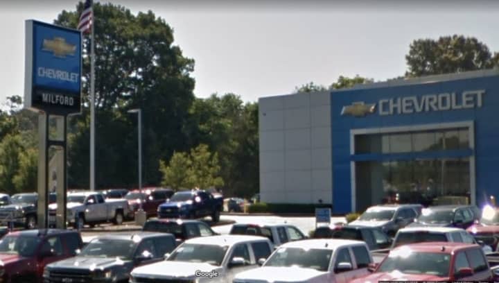 A man was arrested for allegedly stealing $10K in rims and tires from a Milford car dealership.