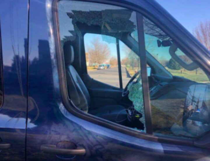 A brick was thrown through a truck window during a road rage incident, injuring the driver.