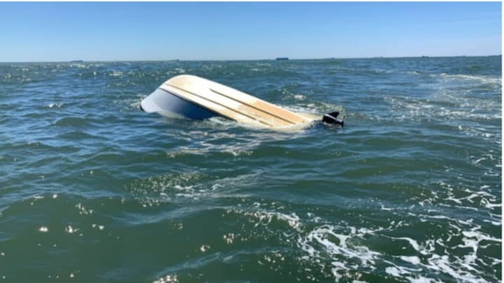 A look at the overturned boat south of Point Lookout.