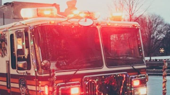 About 150 firefighters from 14 departments responded to a three-alarm fire that broke out a Long Island business.